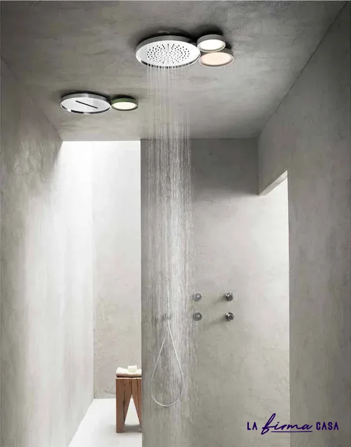 Concrete shower with twin round ceiling heads by Aquaelite in Canada
