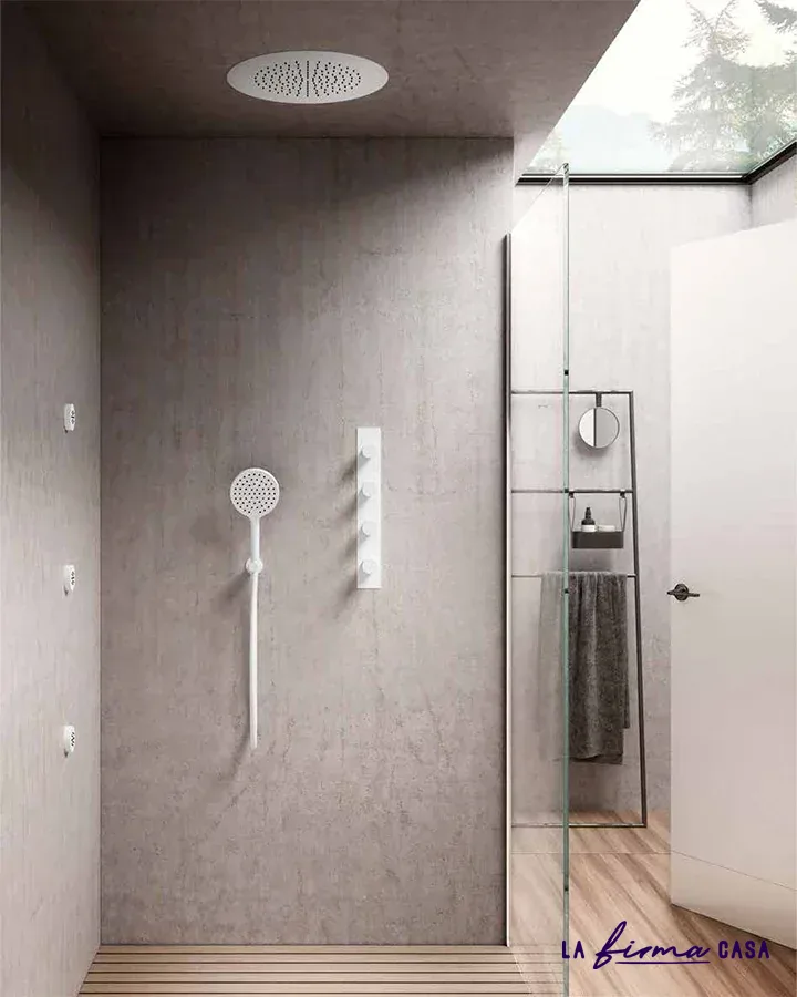 Grey stone shower with ceiling rain head by Aquaelite in Canada