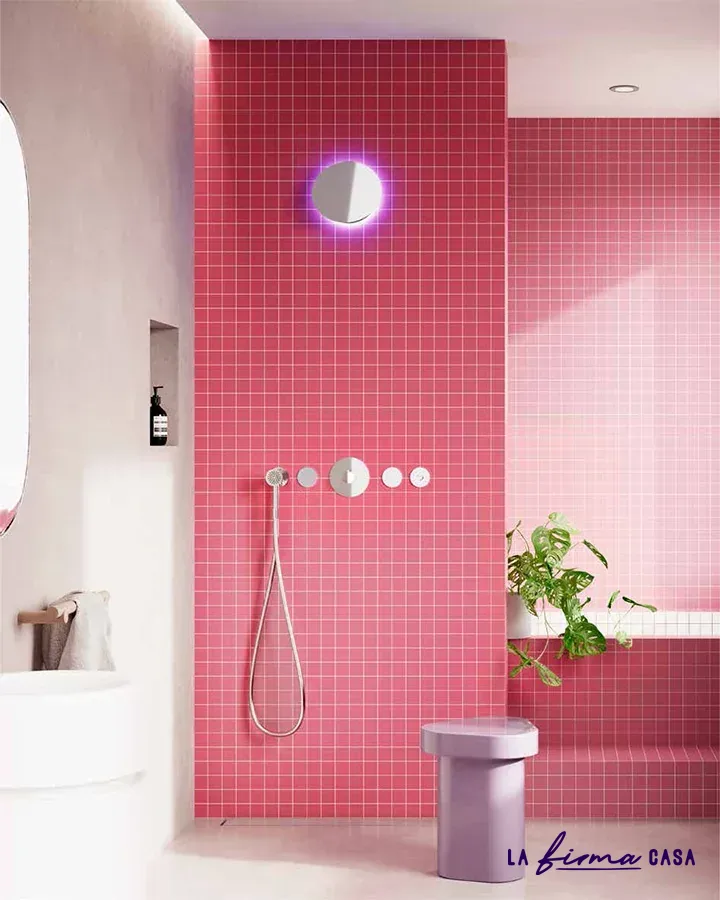 Pink mosaic bathroom with backlit mirror by Aquaelite in Canada