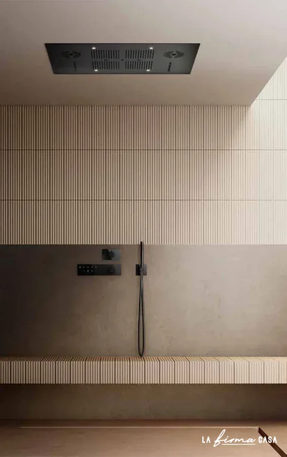 Ribbed cream shower with dark ceiling panel by Aquaelite in Canada