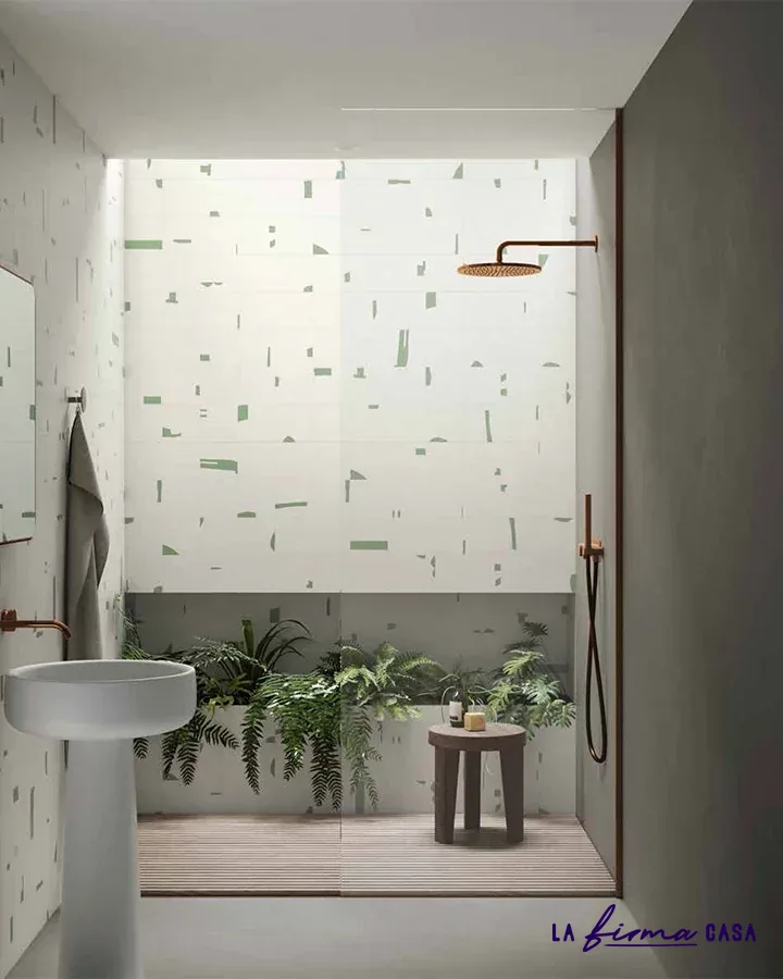 Speckled terrazzo bathroom with copper fittings by Aquaelite in Canada