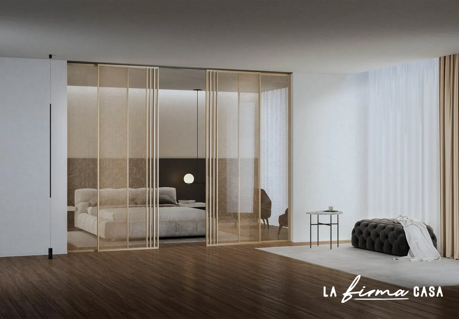 Gold framed sliding glass doors in a bedroom by Barausse in Canada