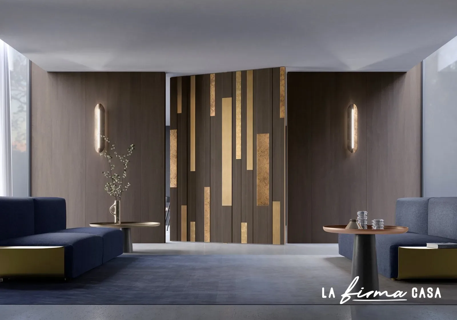 Gold inlaid wall panelling with a blue sofa by Barausse in Canada