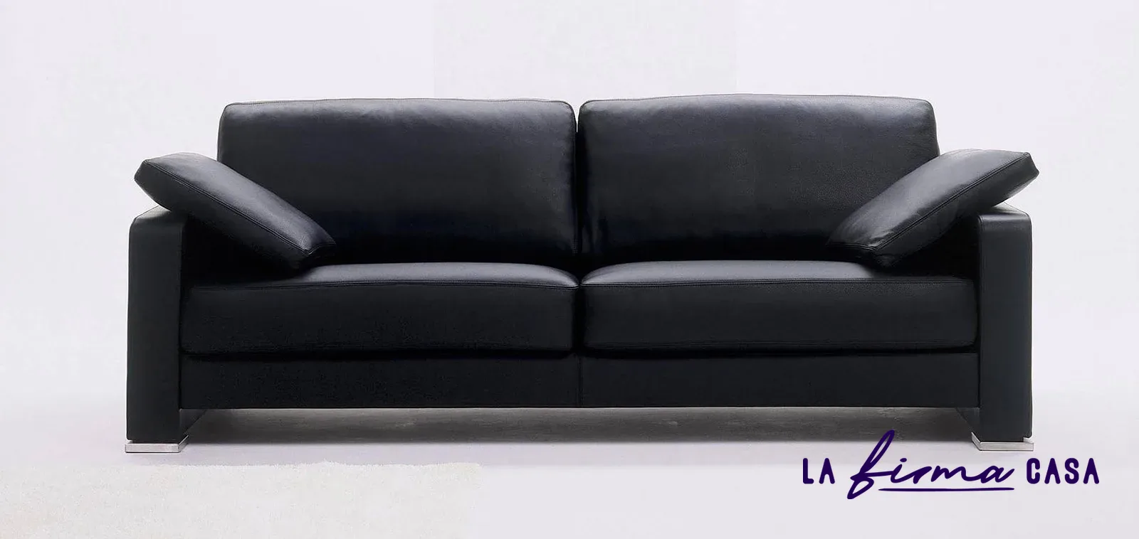 Black leather two seat sofa by Gyform in Canada