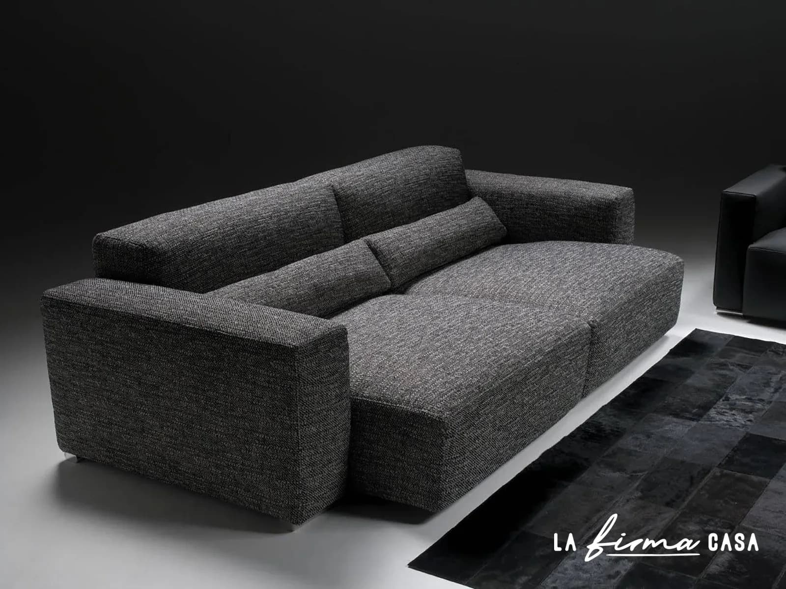 Charcoal sofa with chaise from behind by Gyform in Canada