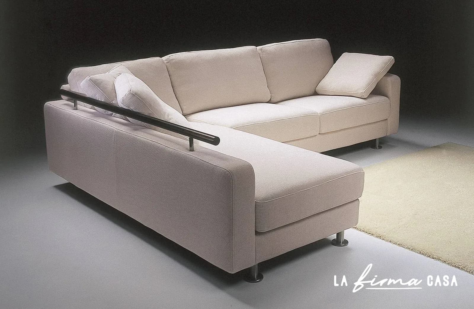 Cream sofa bed with chaise by Gyform in Canada