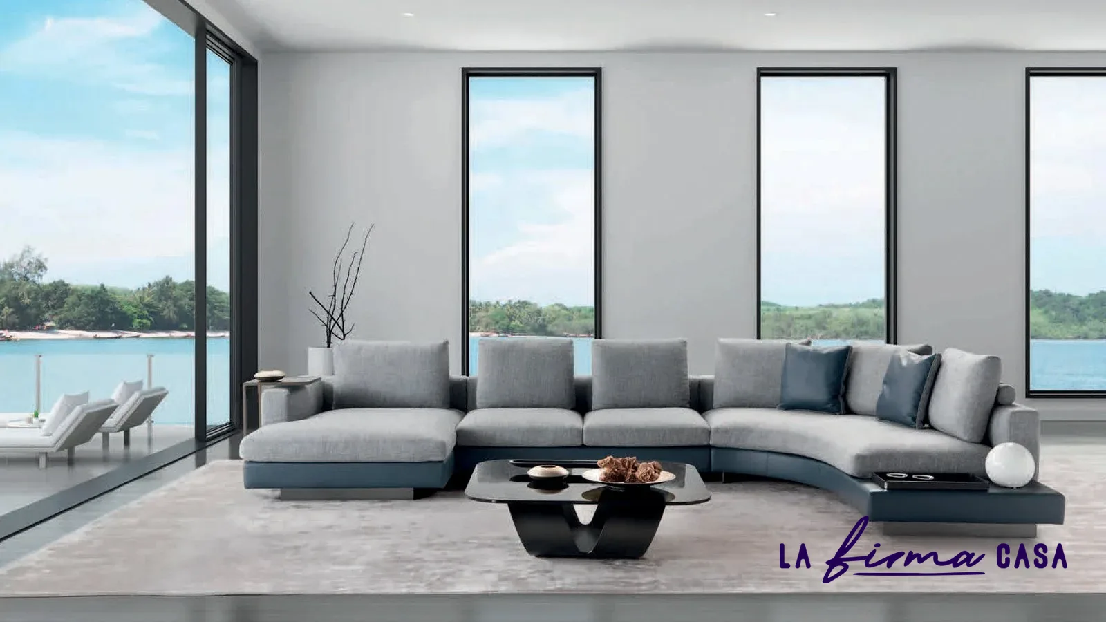 Curved grey sectional facing a pool by Gyform in Canada