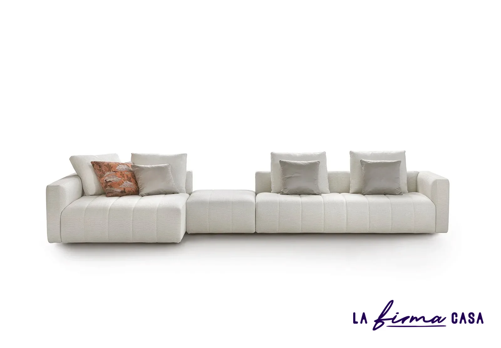 Long cream sofa with chaise and cushions by Gyform in Canada