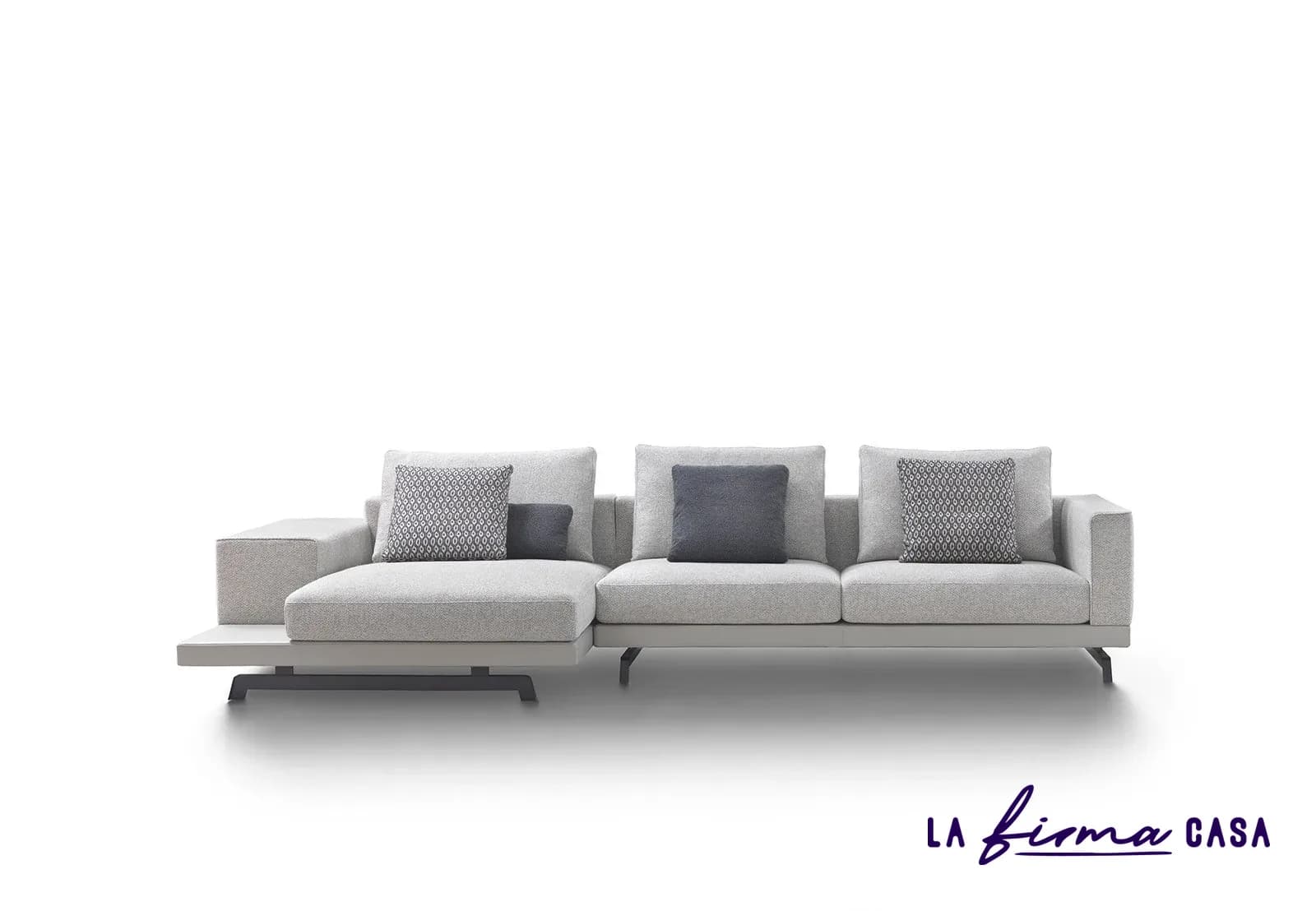 Long white sofa with chaise and tray table by Gyform in Canada