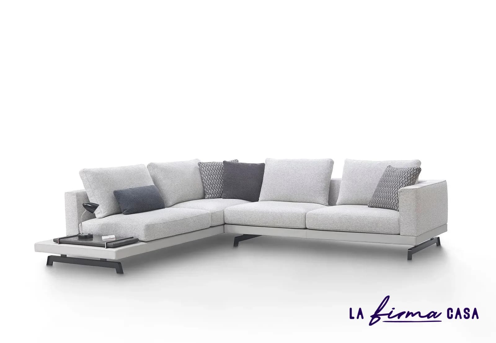 White corner sectional with grey cushions by Gyform in Canada