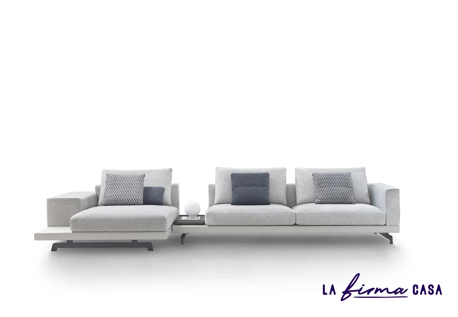 White sofa with split chaise and side table by Gyform in Canada