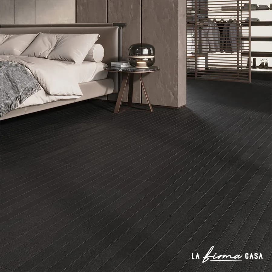 Dark herringbone floor in a bedroom by Italiana Parquet in Canada