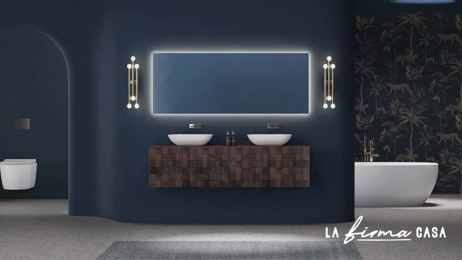 Blue bathroom with backlit mirror and walnut vanity by IW&W in Canada