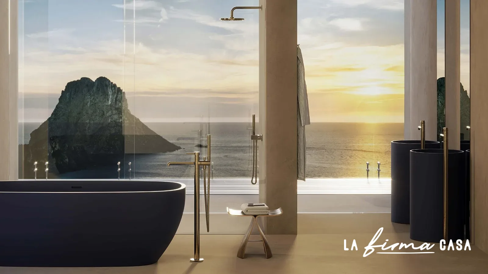 Dark freestanding bath with a cliffside sea view by IW&W in Canada