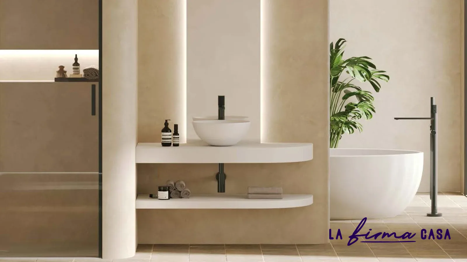 Plaster bathroom with curved vanity and freestanding tub by IW&W in Canada