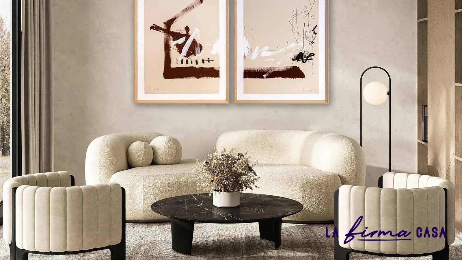 Pair of figurative prints above a boucle sofa by Novocuadro in Canada