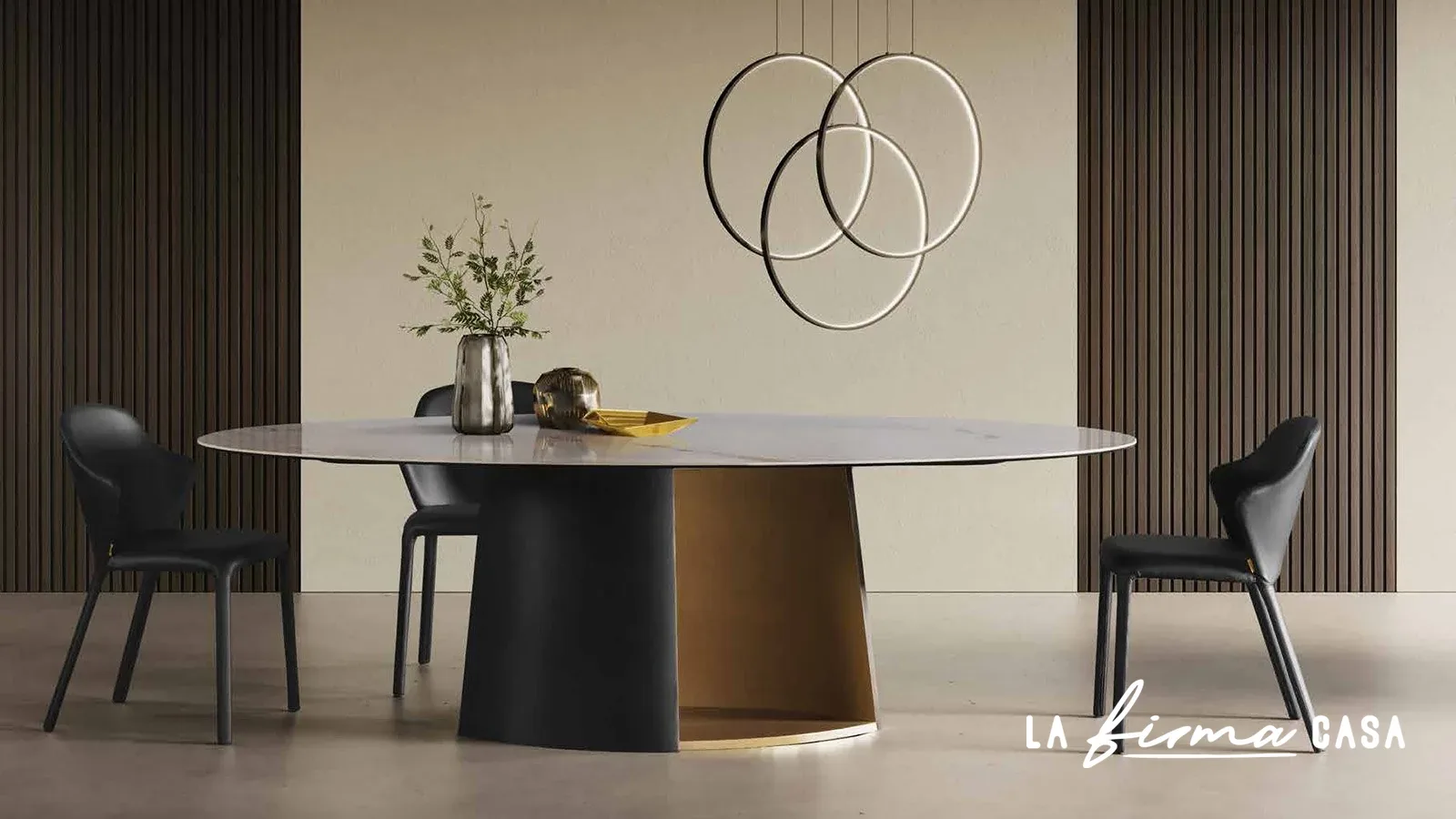 Oval table on a black and brass drum base by Tafaruci in Canada