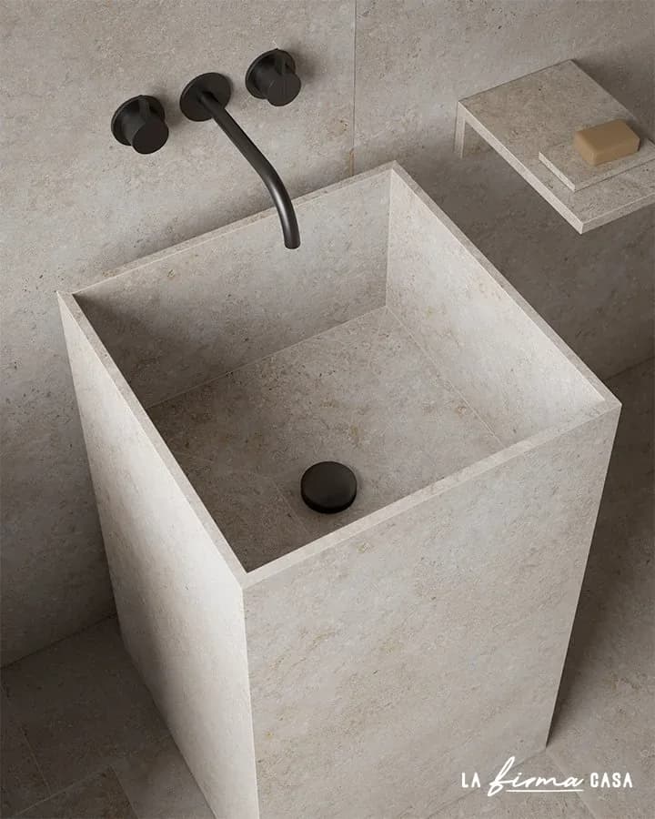 Cream stone monolith basin from above by TerzaDimensione in Canada