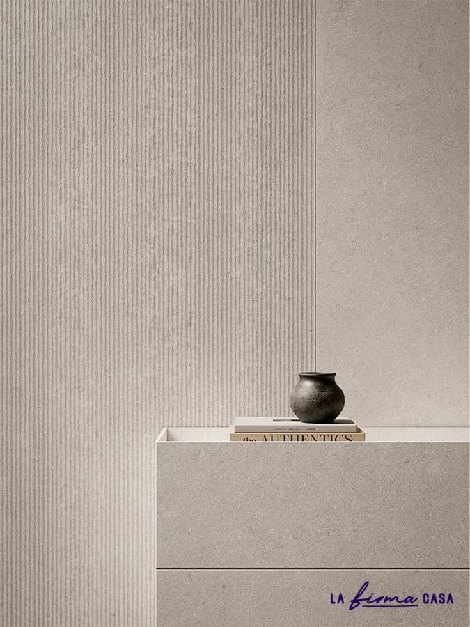 Ribbed cream stone vanity with vase by TerzaDimensione in Canada