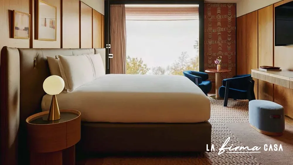 Bedroom rug in a walnut panelled hotel room by Warli in Canada