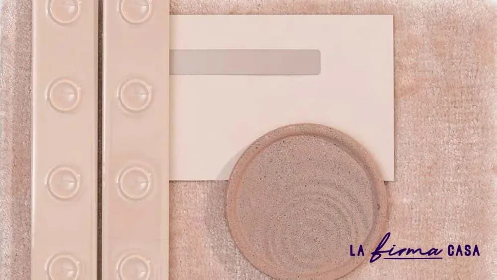 Blush textile and plaster material flatlay by Warli in Canada