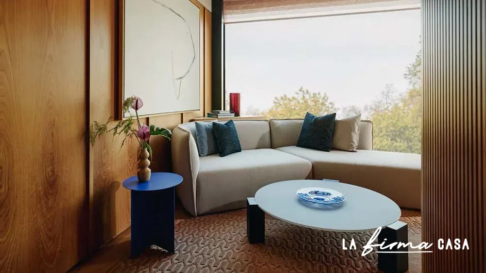 Living room rug with a cream sofa and blue tables by Warli in Canada