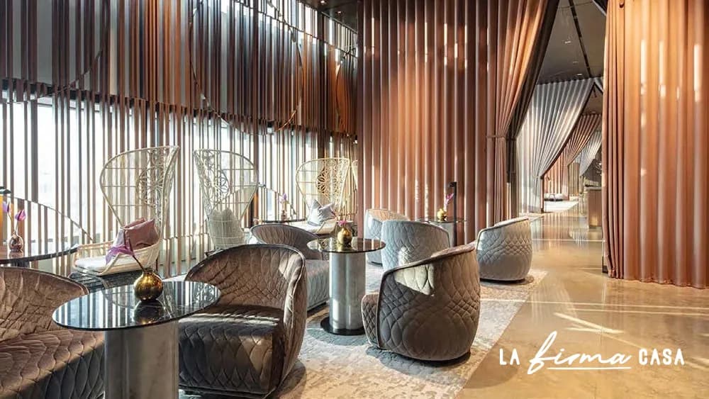 Patterned rug in a copper fluted restaurant by Warli in Canada