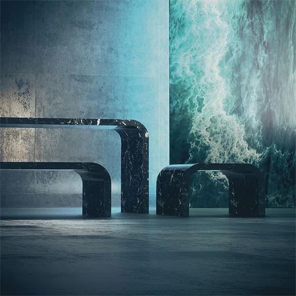 MGM Marble & Stones dark green marble console table and bench on a polished stone floor in front of a full-height crashing-wave backdrop