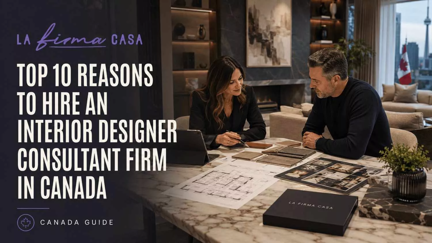 An interior designer and a client reviewing floor plans and material samples at a marble table
